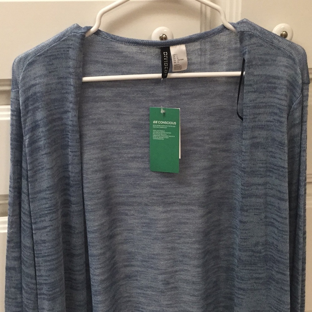 Open front blue cardigan.